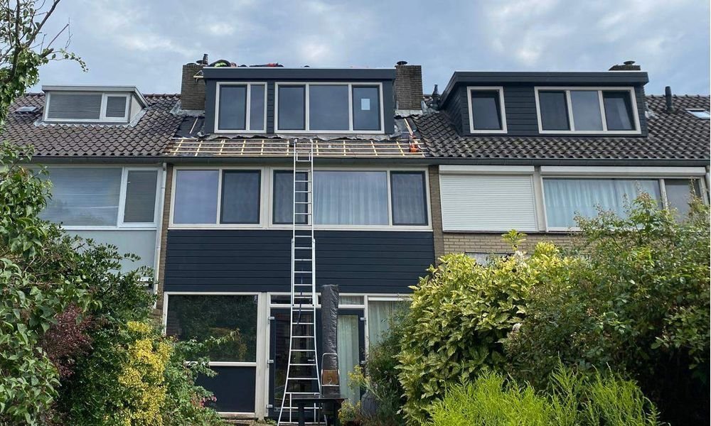 Wat kost een plat dak herstellen in Wassenaar?